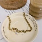 عقد ديور ذهبي