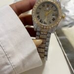 ساعه رولكس فضي ذهبي (زركون)شامل علبه