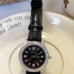 ساعة ڤرزاتشي اسود فضي شامل علبه