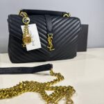 سان لورين اسود(ذهبي) شامل علبه