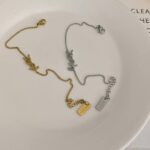 اسواره YSL ذهبي فضي